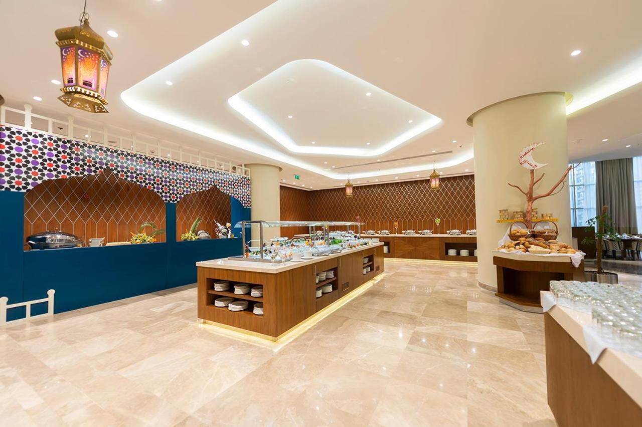 Holiday Suites Al Azizia Mecca Exterior photo The hotel's restaurant
