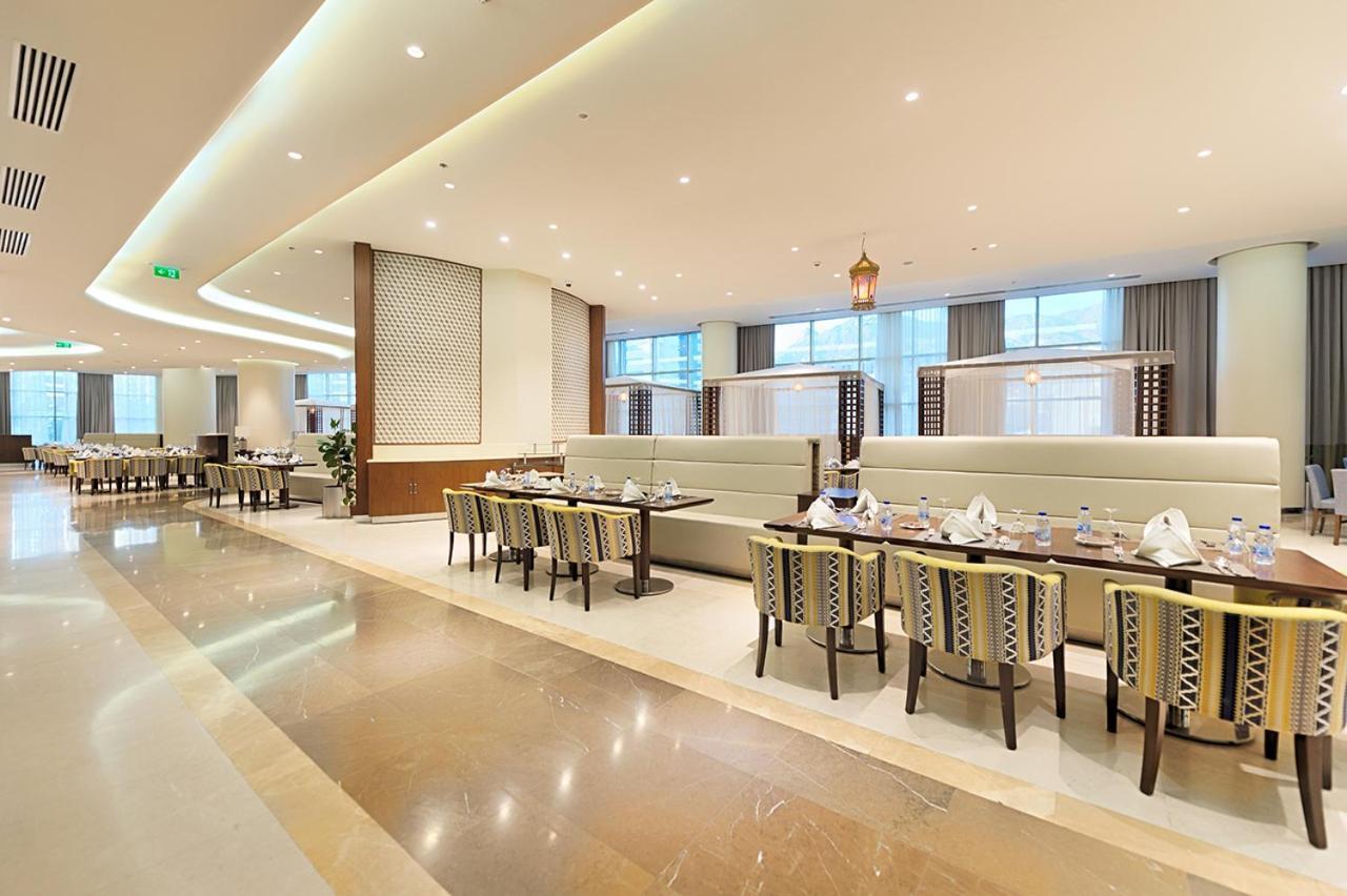 Holiday Suites Al Azizia Mecca Exterior photo The hotel's restaurant